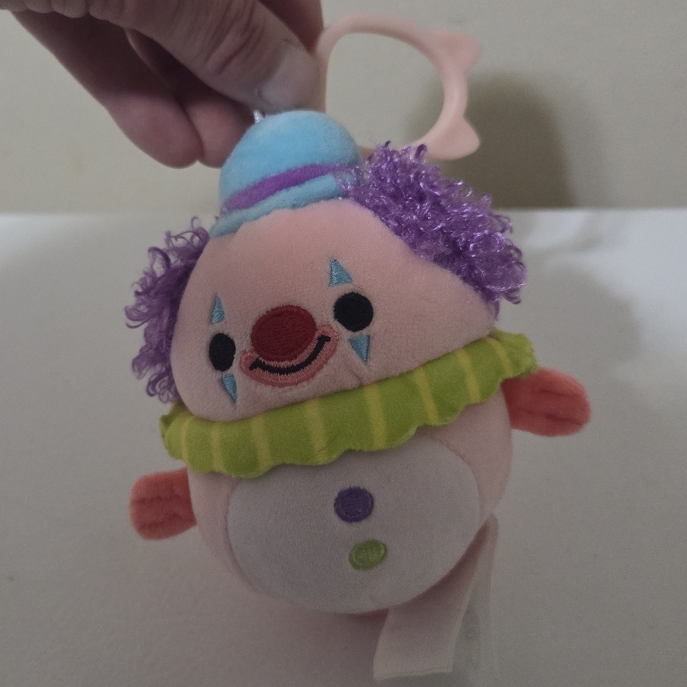 Squishmallows Noy the Blobfish Clown clip-on plush toy.